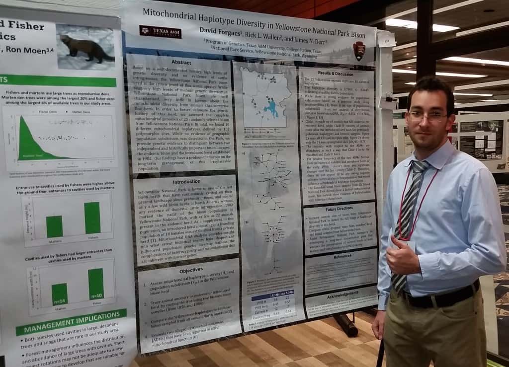 David Forgacs stands in front of his winning poster at the TWS 2015 Conference in Winnipeg. Image Credit: Caitlin Curry
