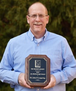Loegering holds the plaque that he won as part of the Jim McDonough award. ©Terry Tollefson, staff photographer, University of Minnesota