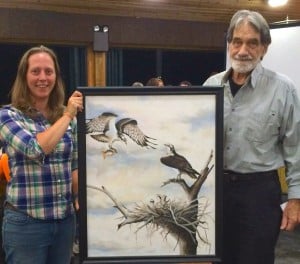 Emily Thomas (PATWS Past President) presented Dr. Charles P. "Hoagy" Schaadt with an osprey painting by wildlife artist Dave Hughes as part of the Gordon Kirkland Award for Lifetime Professional Achievement in Conservation, which Hoagy.