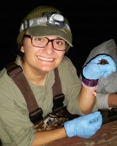 Katie Teets holds a tri-colored bat. ©Katie Teets