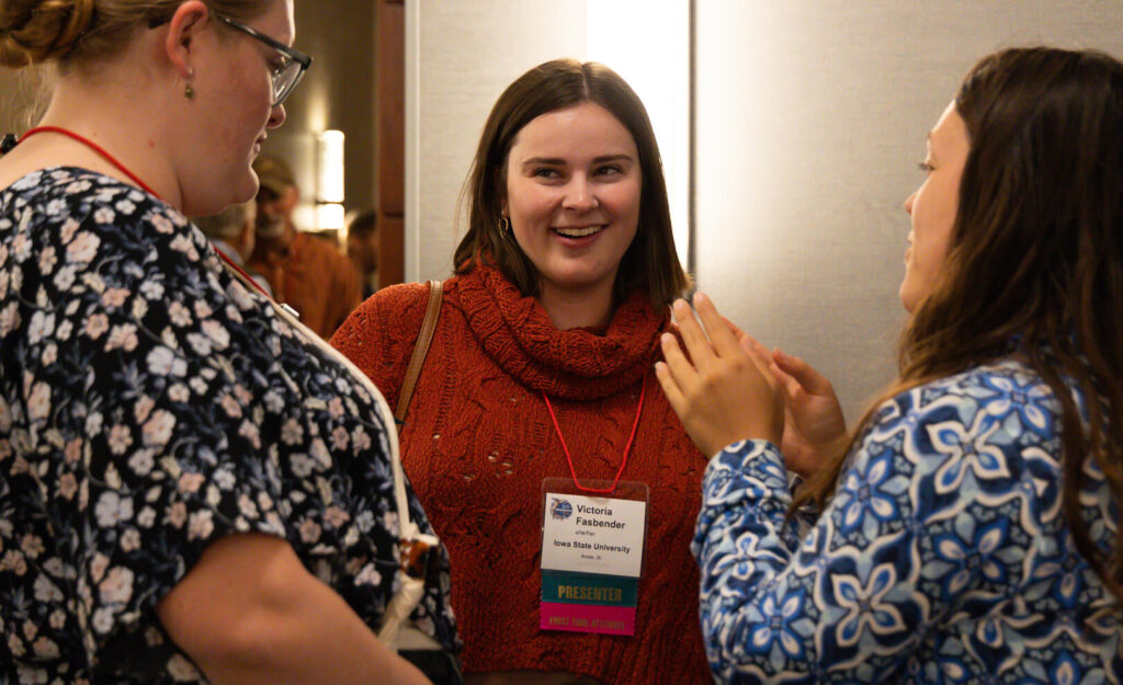 Three female wildlife conservation professionals discuss conservation policy developments at The Wildlife Society's annual conference