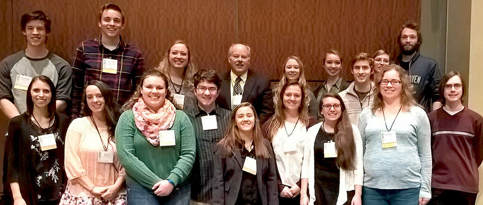 President Potts poses for a photo with the Northern Michigan University Student Chapter.