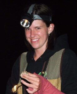 Green’s student Nicole Sanderson with a Fowler’s toad. Green worked with students to capture toads in order to collect abundance data on the species. ©David Green  