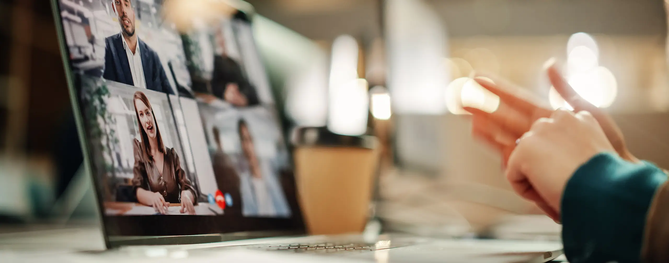 Wildlife professional attending a webinar on conservation research on their laptop