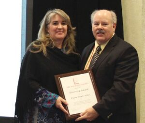 Diana Doan-Crider accepts the 2015 Diversity Award at The Wildlife Society’s 22nd Annual Conference in Winnipeg last fall. 