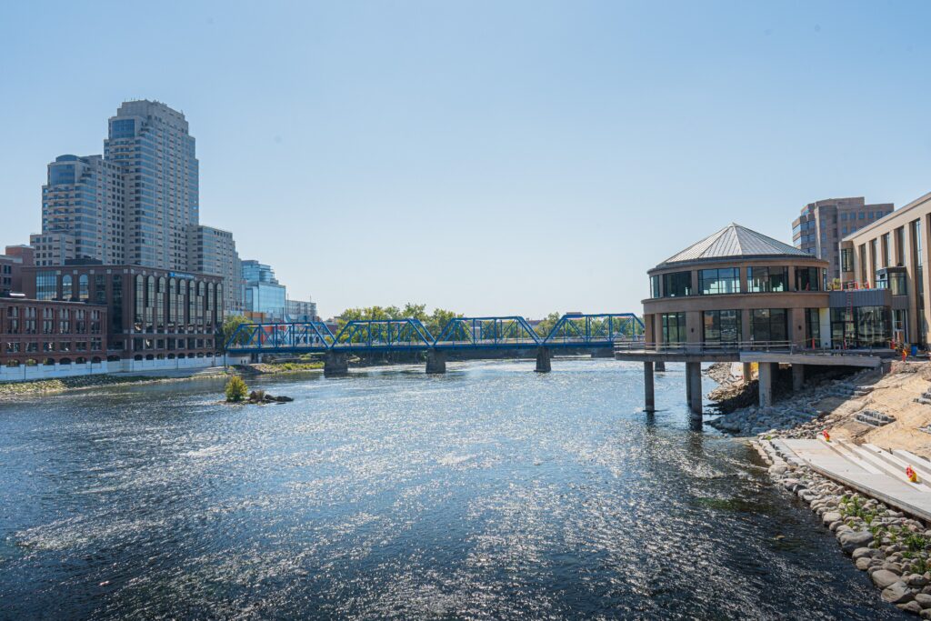 cityscape with river and bridge